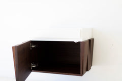 Detail of the door pull on the floating nightstand