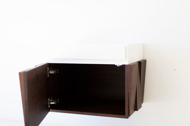 Detail of the door pull on the floating nightstand