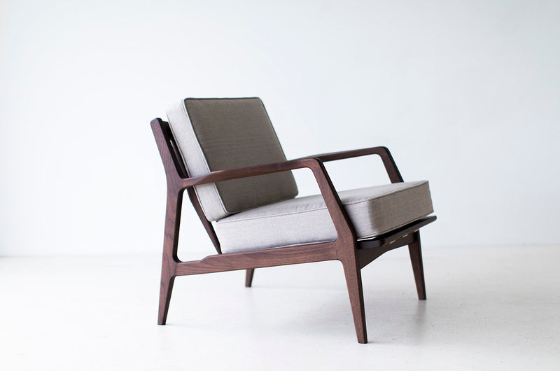 Lawrence Peabody walnut lounge chair from the Selig Collection, front view