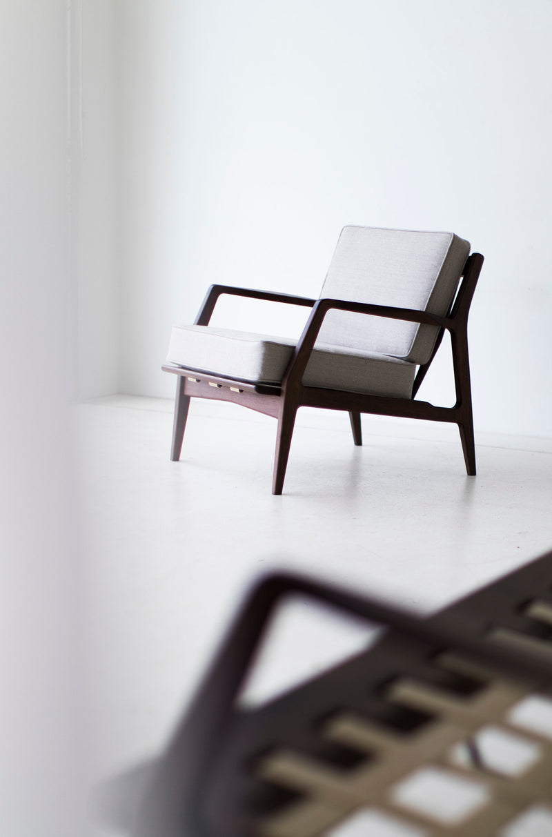 Side profile of the Lawrence Peabody Selig lounge chair