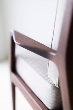 Detail of the walnut wood grain on the lounge chair frame