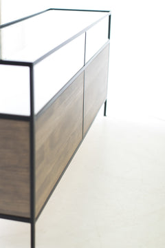 Close-up of the weathered pine wood grain on the modern luxury credenza