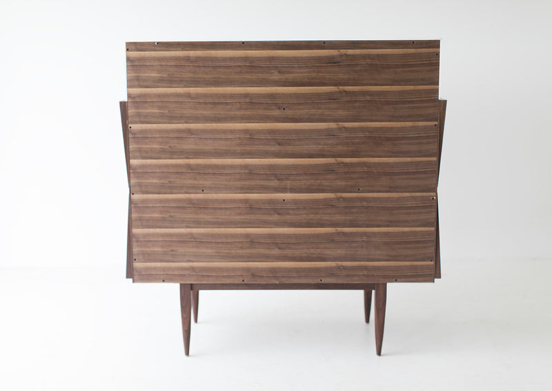 Detail of the drawer pulls on the modern walnut dresser