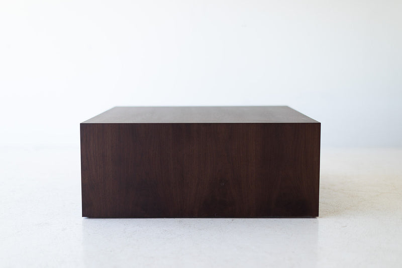 Modern luxury walnut coffee table styled in a living room