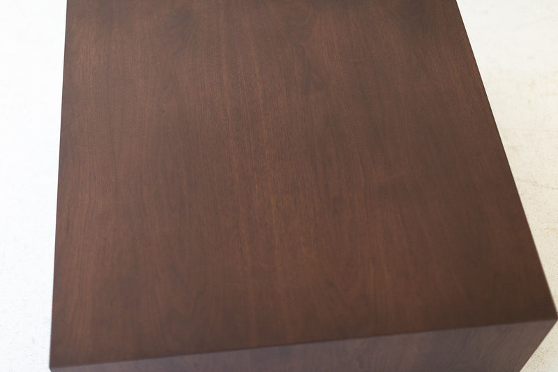 Modern luxury walnut coffee table shown from above