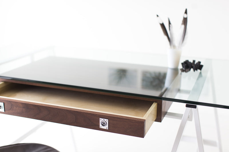 Side profile of the modern luxury walnut writing desk with glass top