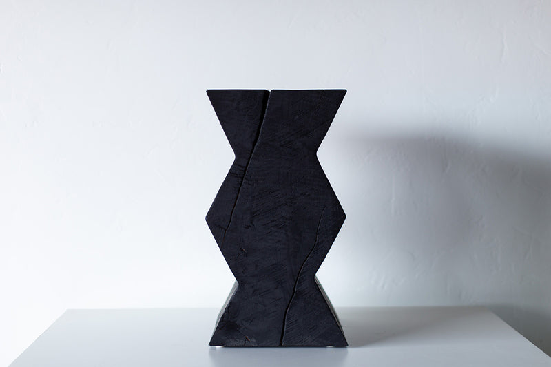 Side profile of the burnt finish end table